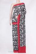 Black Dual Tone Crepe Saree with Printed design on the body and Printed Border.  displayed on a mannequin