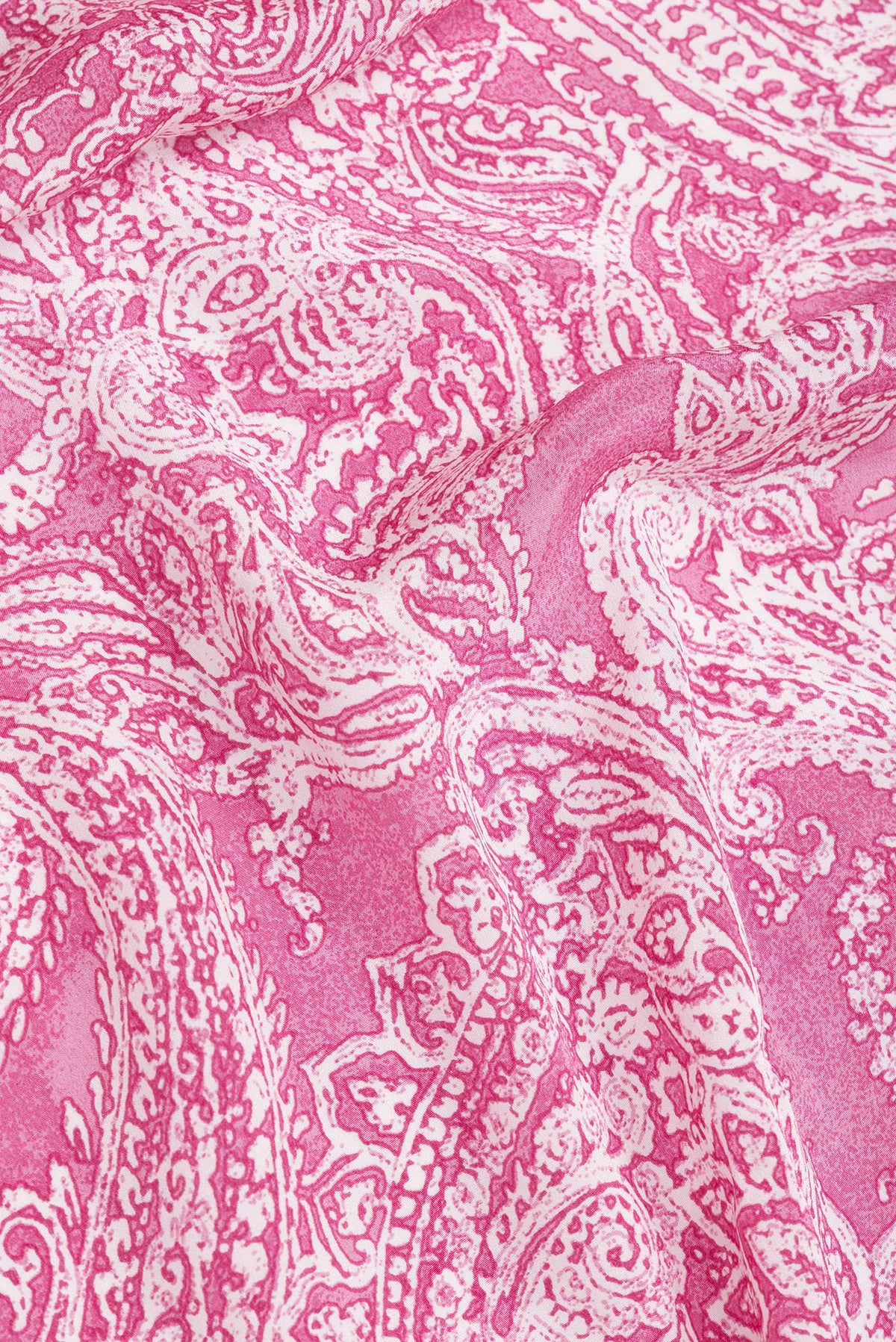 Close up of Pink Dual Tone Mysore Crepe Saree with Printed design on the body and Without Border.  displaying folds
