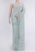 Pista Green Dual Tone Mysore Crepe Saree with Printed design on the body and Printed Border.  displayed on a mannequin