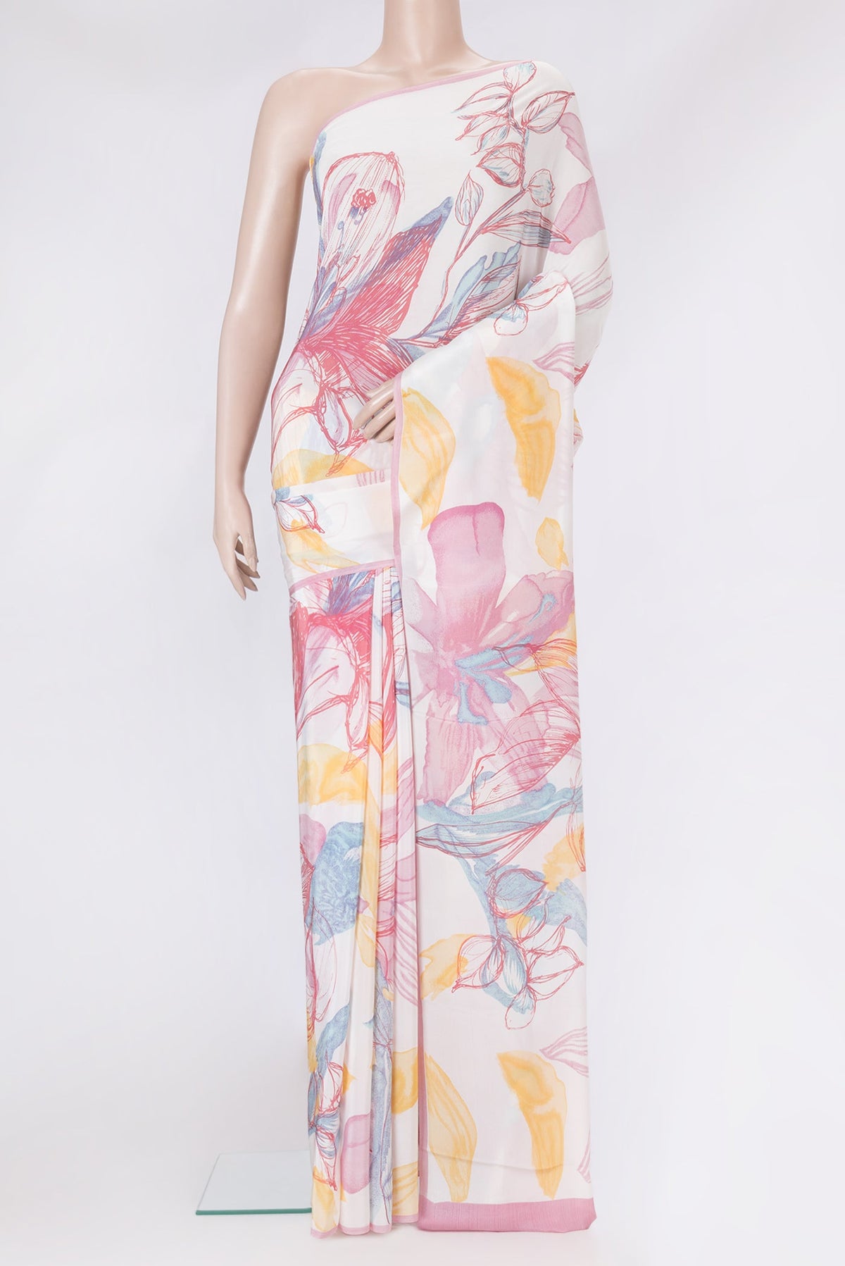 Off White Dual Tone Crepe Saree with Printed design on the body and Without Border.  displayed on a mannequin