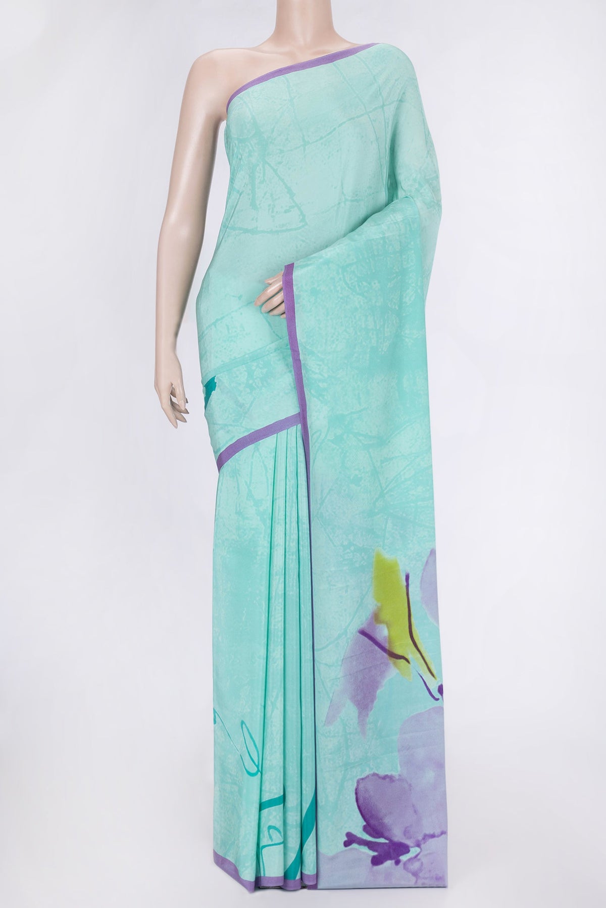 Sky Blue Dual Tone Mysore Crepe Saree with Printed design on the body and Plain Border.  displayed on a mannequin