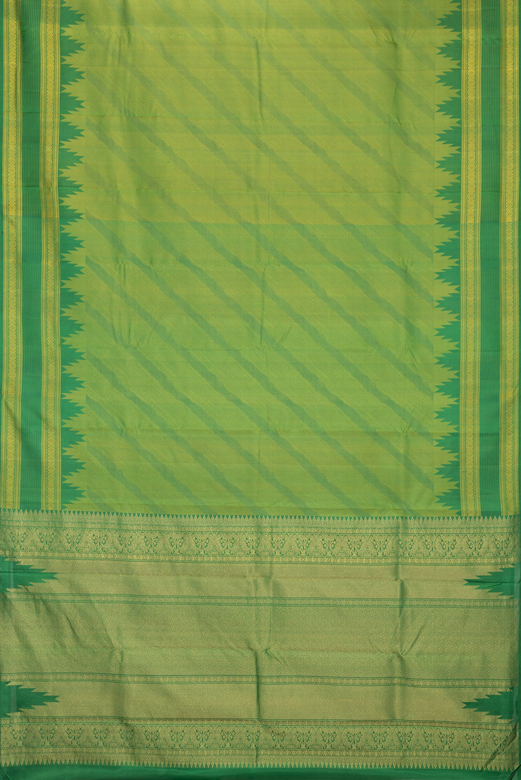 Flat view of Green Dual Tone Kanchipuram Silk Saree with Jacquard design on the body and Thread Border. 