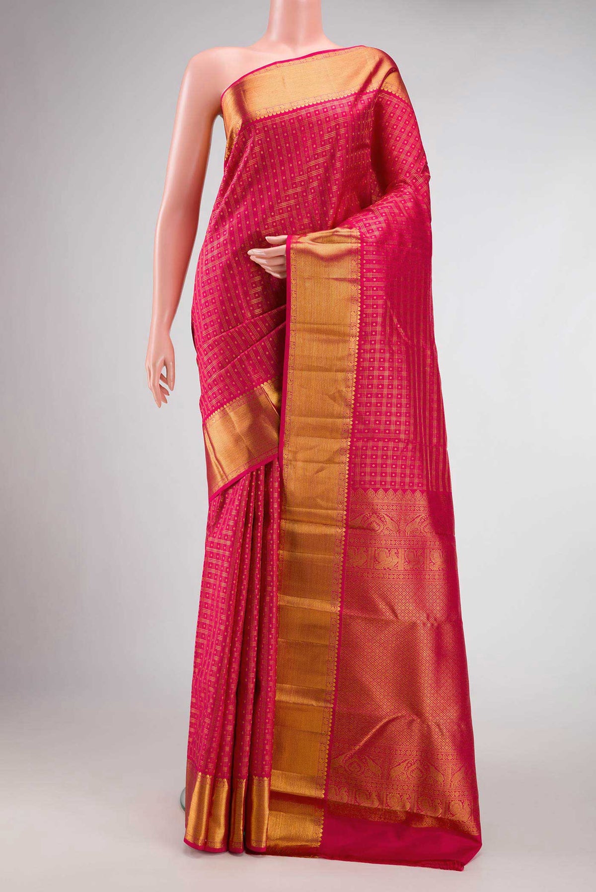 Dark Pink Dual Tone Kanjivaram Silk Saree with Zari Brocade on the body and Zari Border.  displayed on a mannequin
