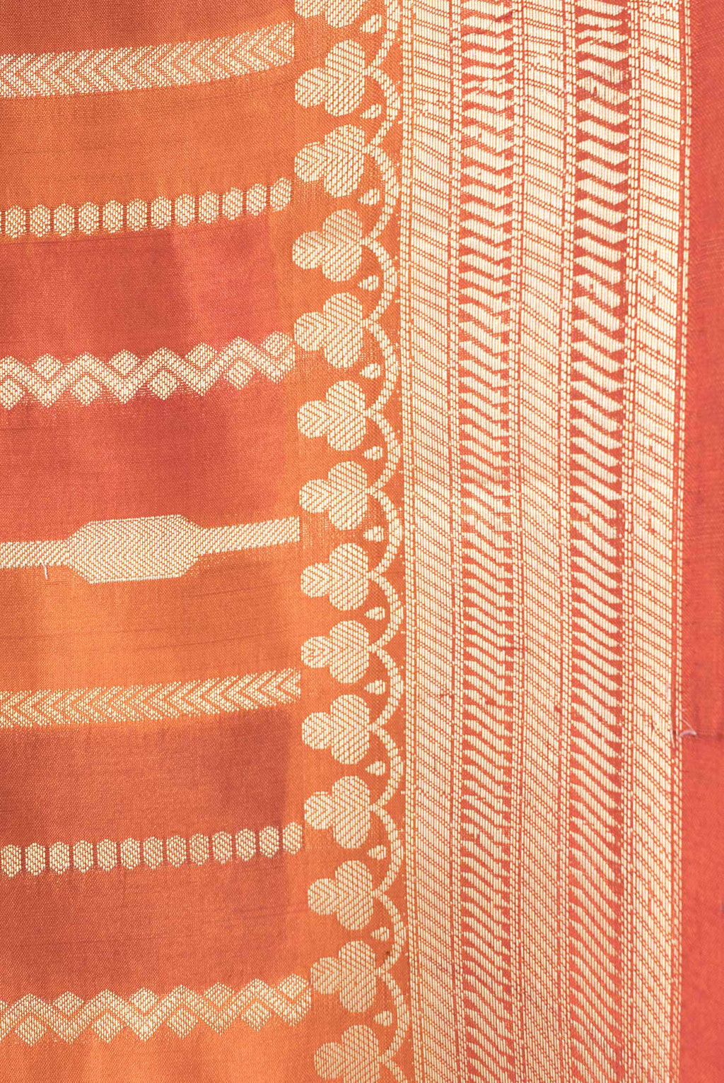 Border image of Orange Dual Tone Tussar Silk Saree with Stripes on the body and Zari Border. 