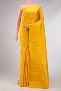 Yellow Dual Tone Kanchipuram Silk Saree with Checked design on the body and Zari Border.  displayed on a mannequin