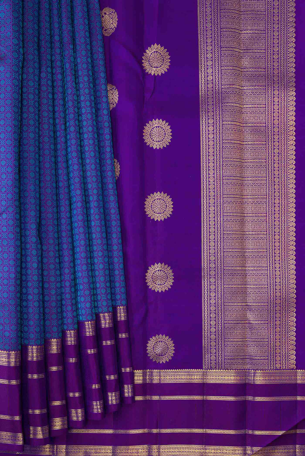 Pleats and pallu of Pure Silk Pure Zari Royal Blue Dual Tone Kanjivaram Saree with Jacquard With Zari Butta on the body and Zari Border. 