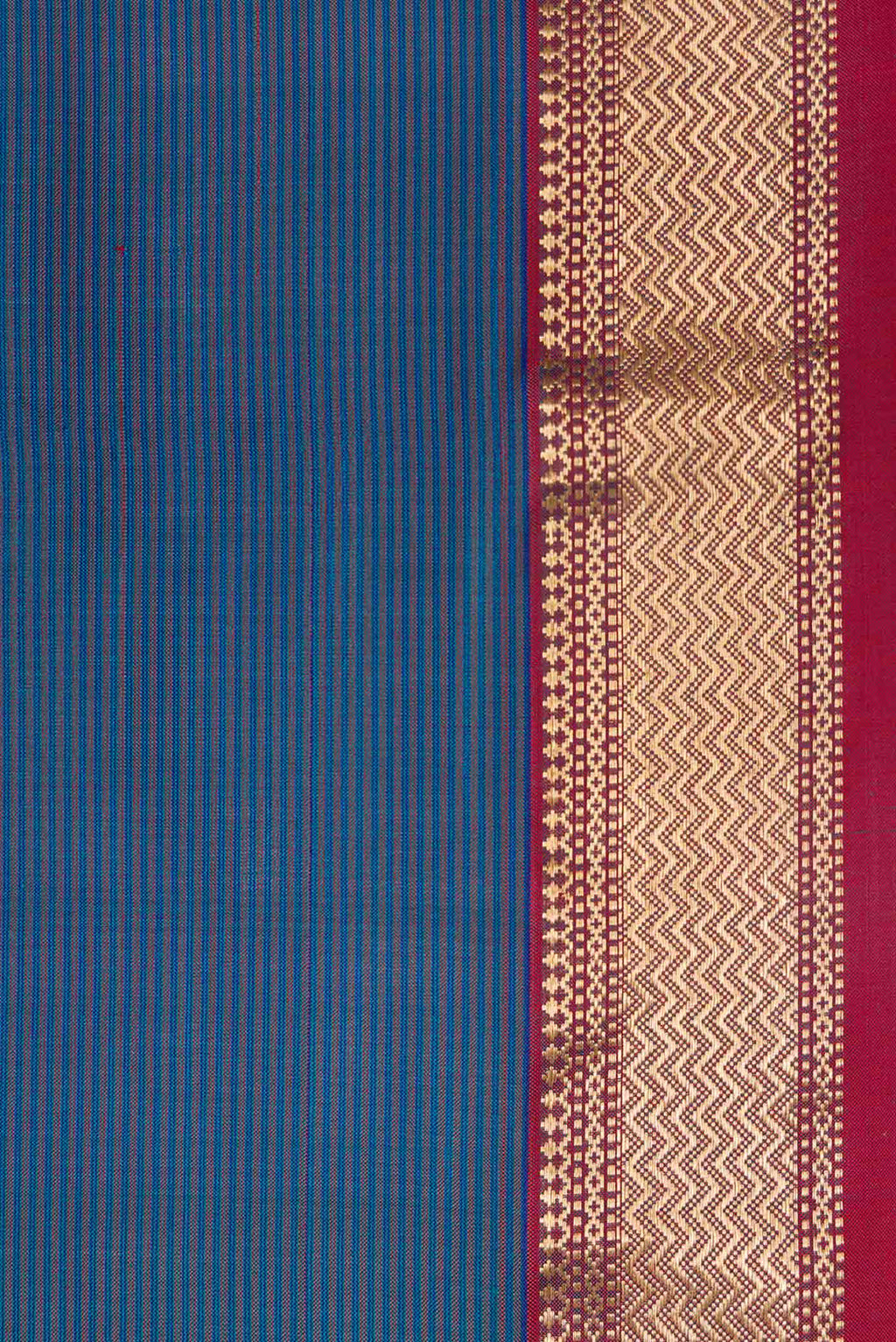 Border image of Peacock Blue Dual Tone Maheshwari Silk Saree with Stripes on the body and Zari Border. 