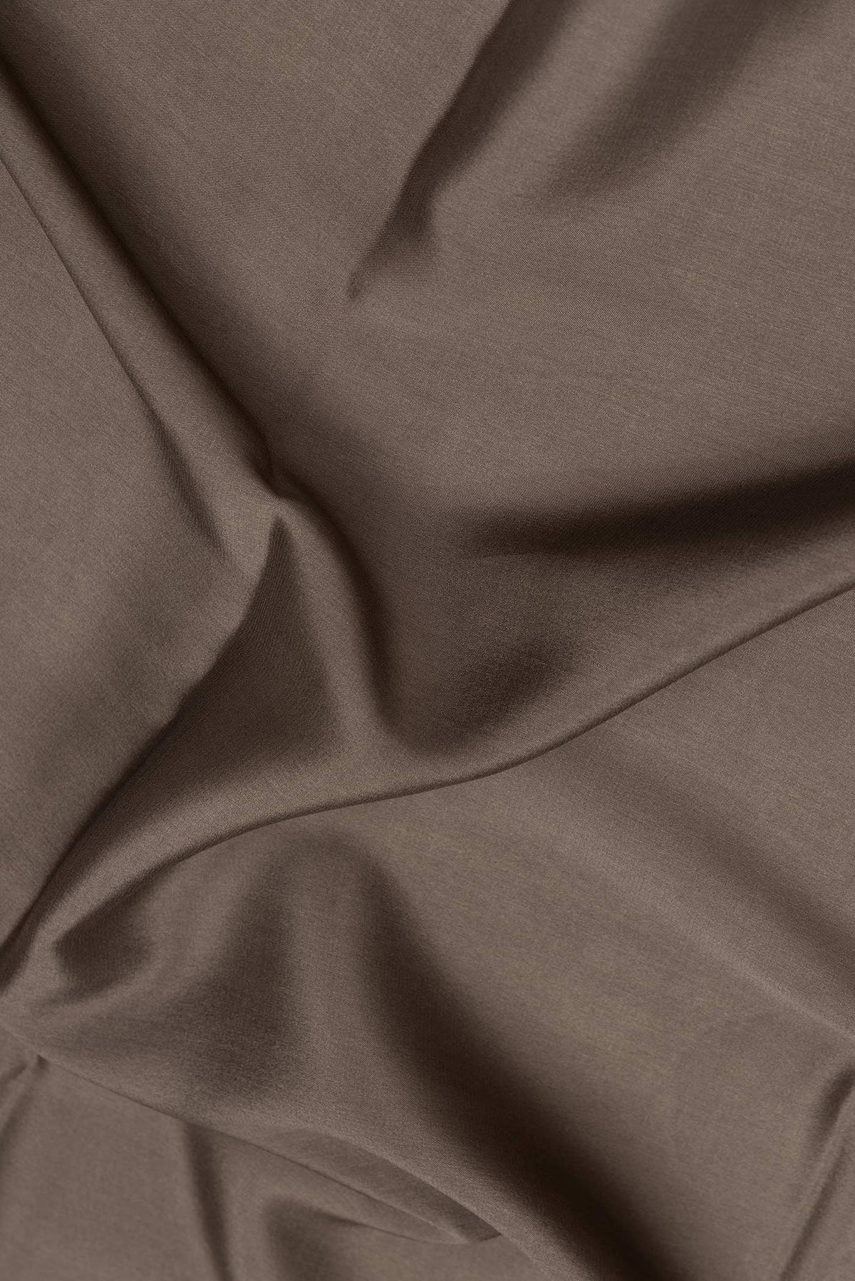 Close up of Mehandi Green Dual Tone Mysore Silk Saree with Plain Body and Zari Border.  displaying folds