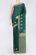 Bottle Green Dual Tone Mysore Georgette Saree with Zari Butta on the body and Zari Border.  displayed on a mannequin