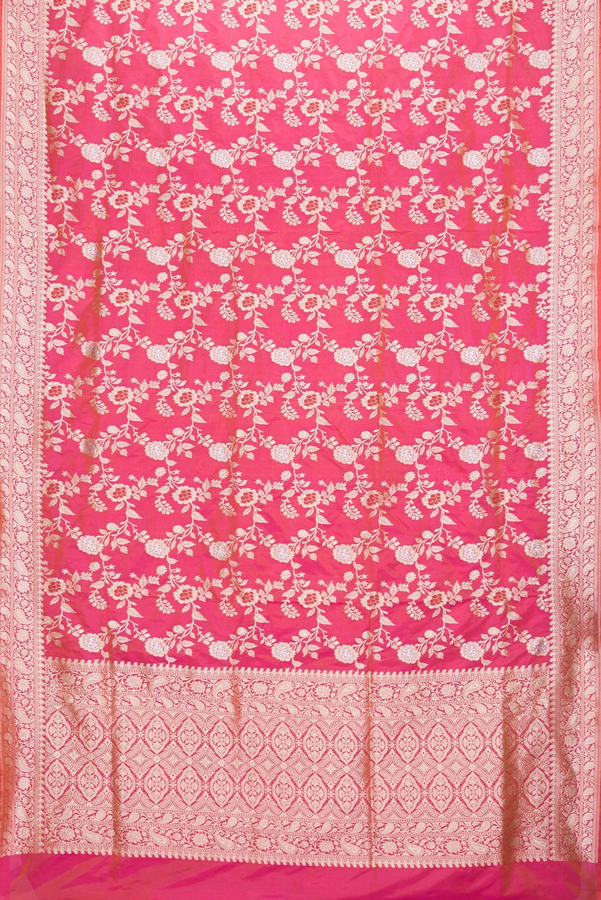 Flat view of Pink Dual Tone Banarasi Silk Saree with Zari Brocade on the body and Zari Border. 