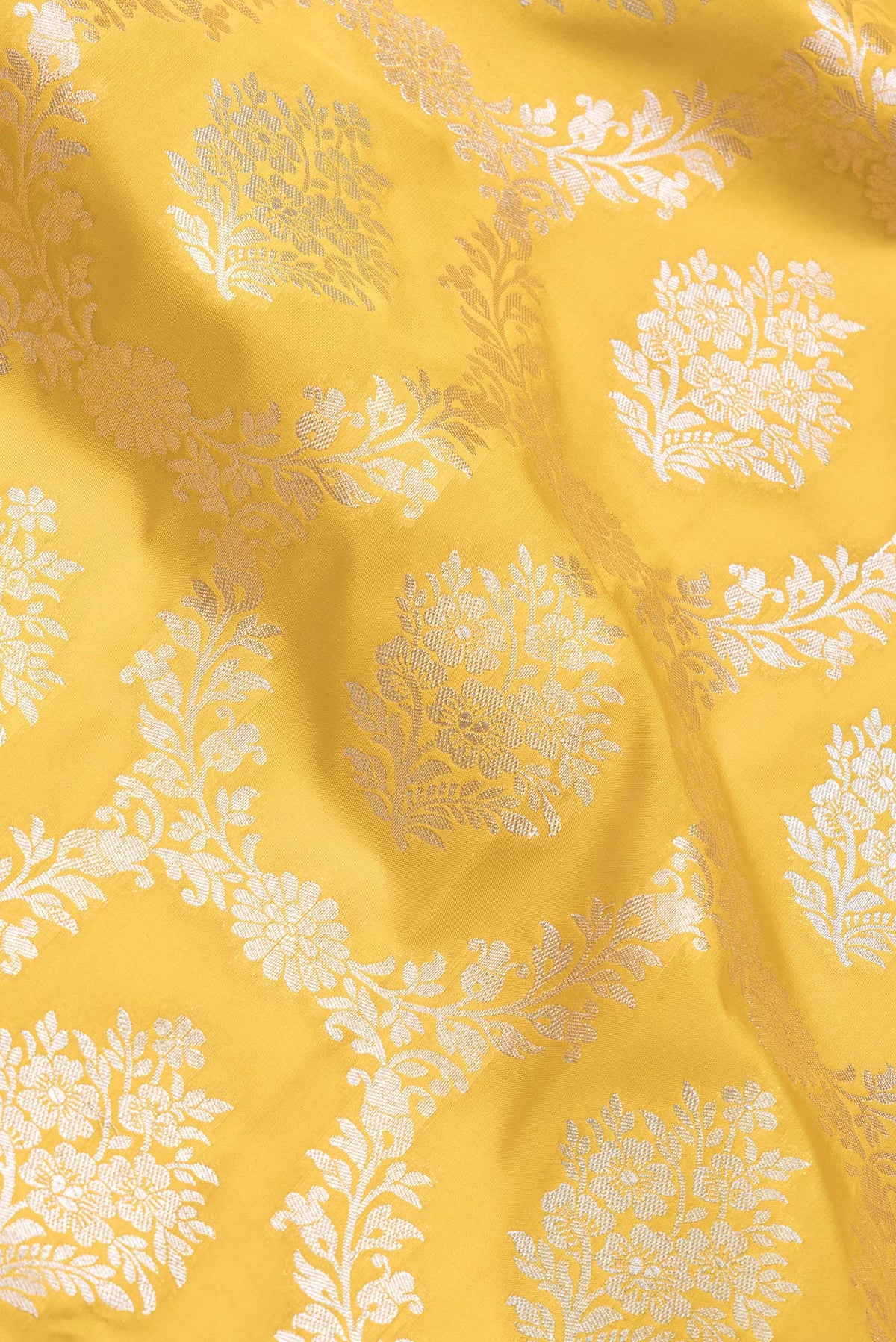Close up of Yellow Dual Tone Blended Banarasi Silk Saree with Zari Brocade on the body and Zari Border.  displaying folds