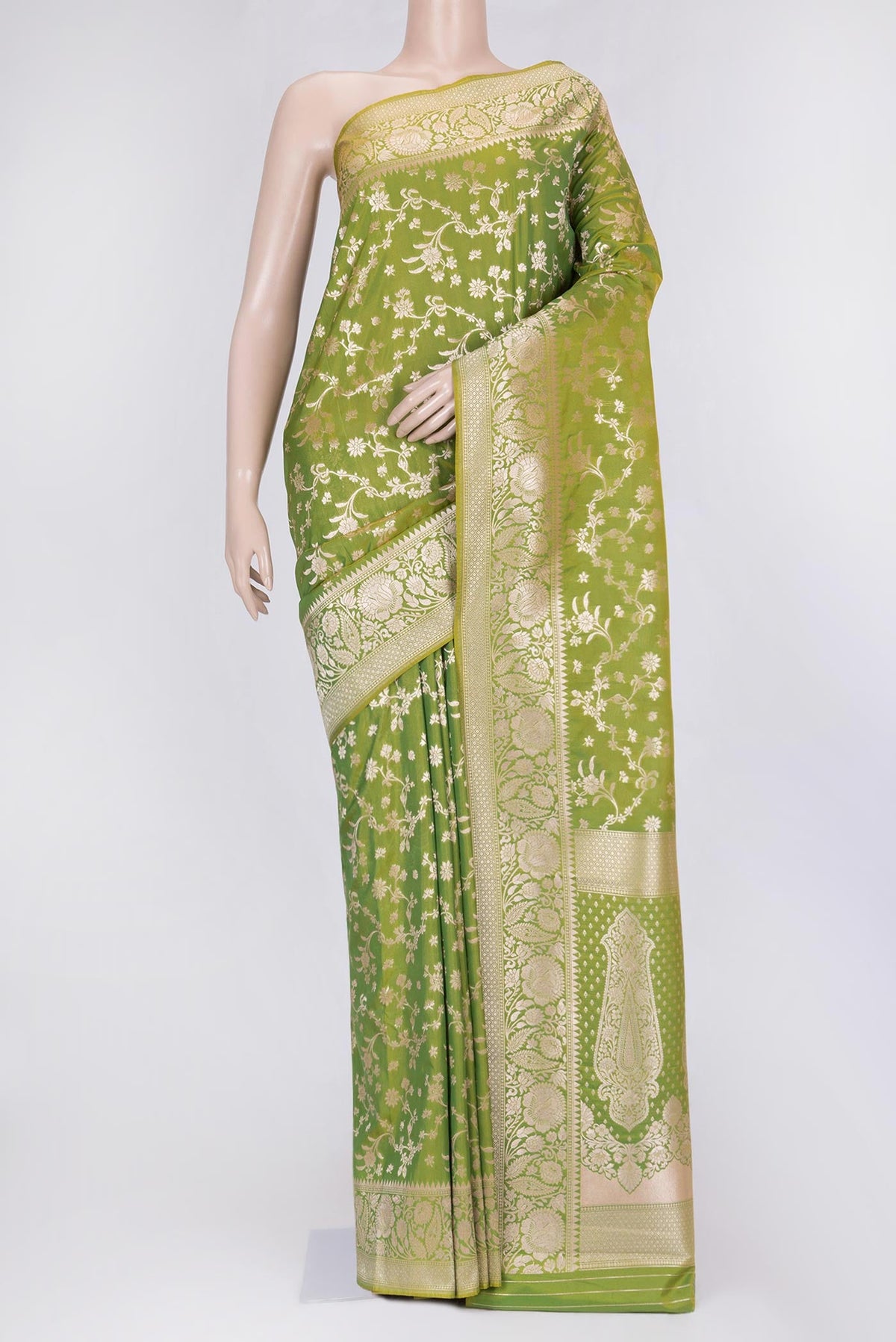 Parrot Green Dual Tone Blended Banarasi Saree with Zari Brocade on the body and Zari Border.  displayed on a mannequin