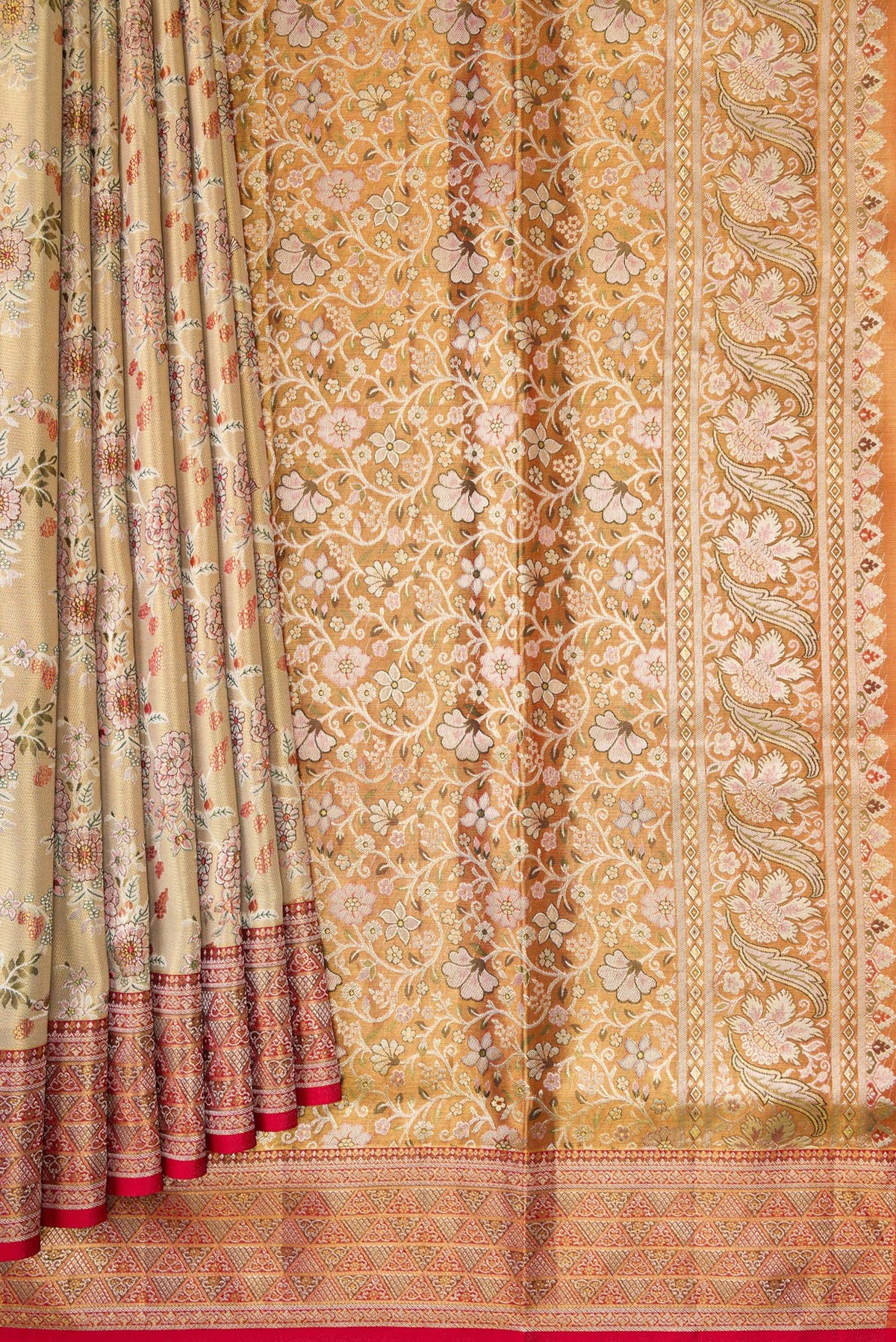 Pleats and pallu of Gold Dual Tone Kanchipuram Tissue Silk Saree with Zari Brocade on the body and Zari Border. 