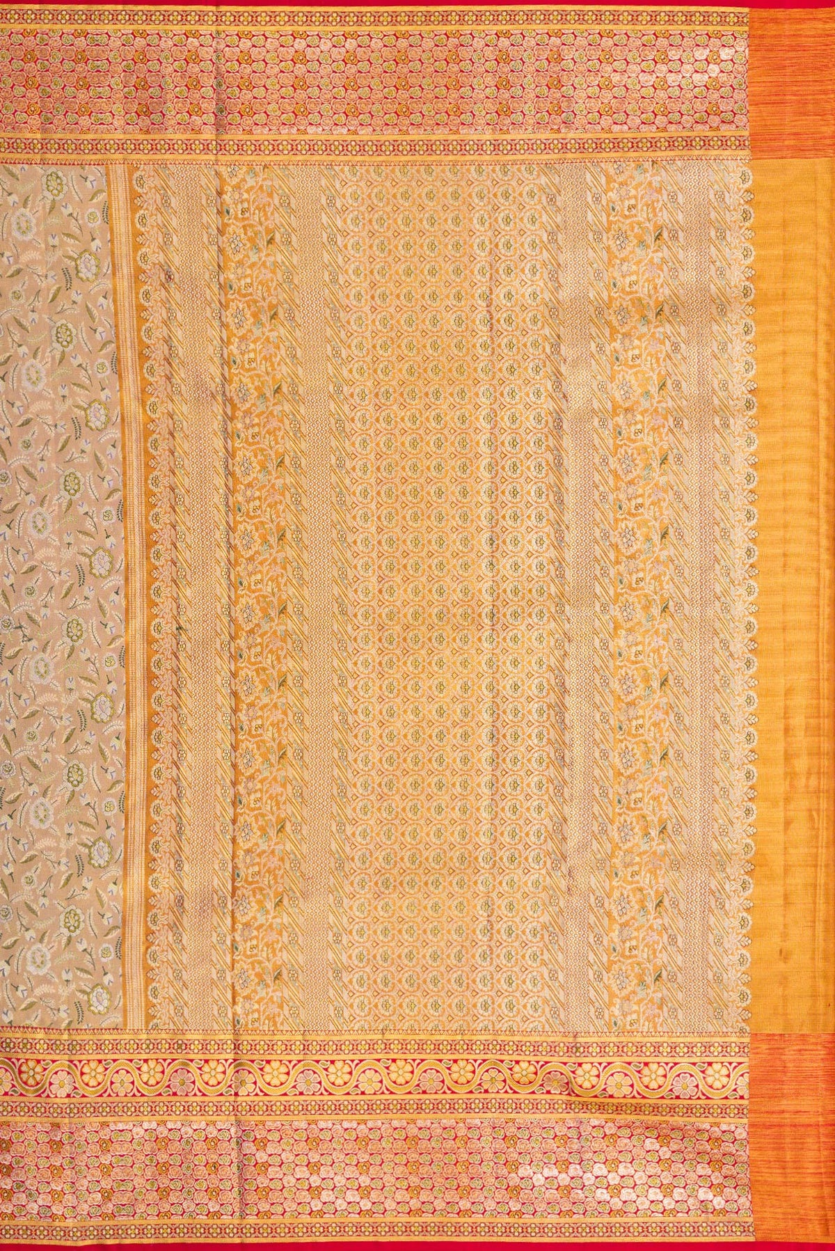 Close up image of the pallu of Gold Dual Tone Kanchipuram Tissue Silk Saree with Zari Brocade on the body and Fancy Border. 