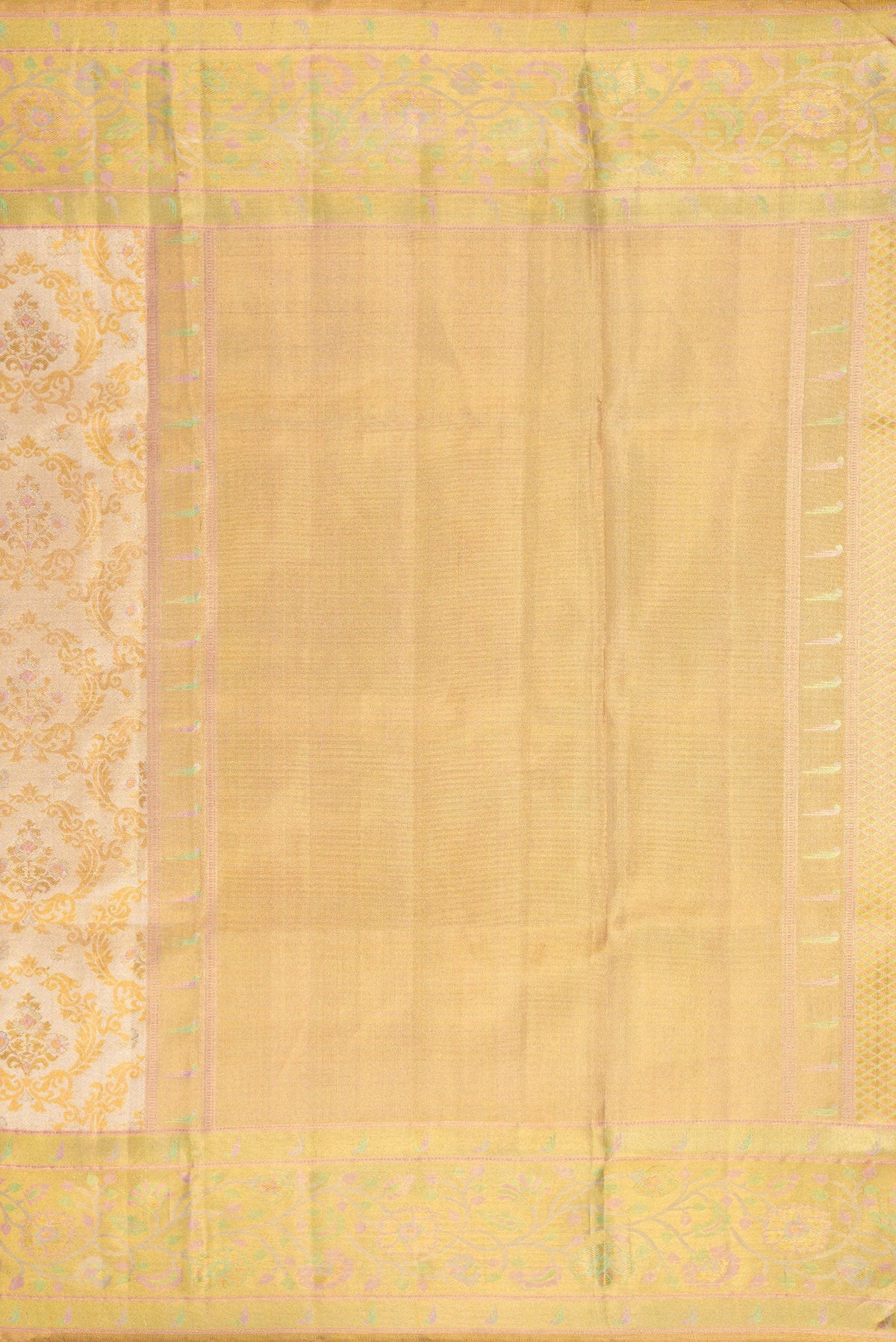 Close up image of the pallu of Gold Dual Tone Kanjivaram Tissue Silk Saree with Zari Brocade on the body and Fancy Border. 