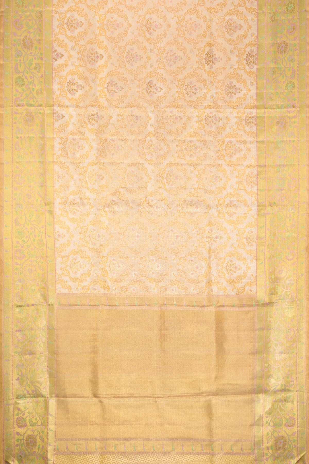 Flat view of Gold Dual Tone Kanjivaram Tissue Silk Saree with Zari Brocade on the body and Fancy Border. 