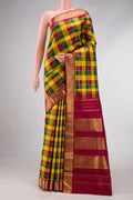 Pure Silk Pure Zari Maroon, Green and Yellow Color Kanchipuram Saree with Checked design on the body and Zari Border.  displayed on a mannequin