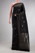 Black Dual Tone Kanjivaram Silk Saree with Zari And Thread Butta on the body and Zari Border.  displayed on a mannequin