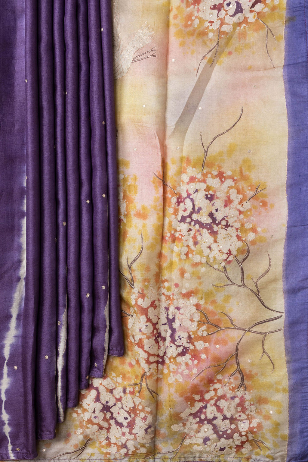 Pleats and pallu of Purple Dual Tone Tussar Silk Saree with Embroidery on the body and Without Border. 