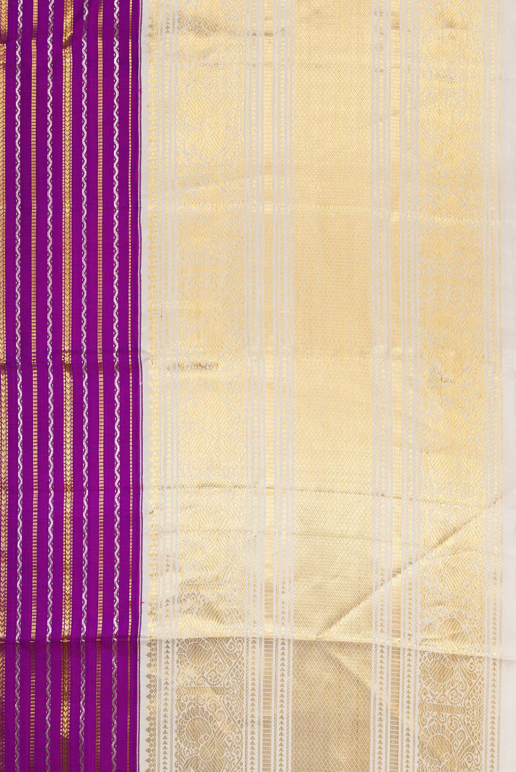 Border image of Magenta Dual Tone Kanchipuram Silk Saree with Stripes on the body and Zari Border. 