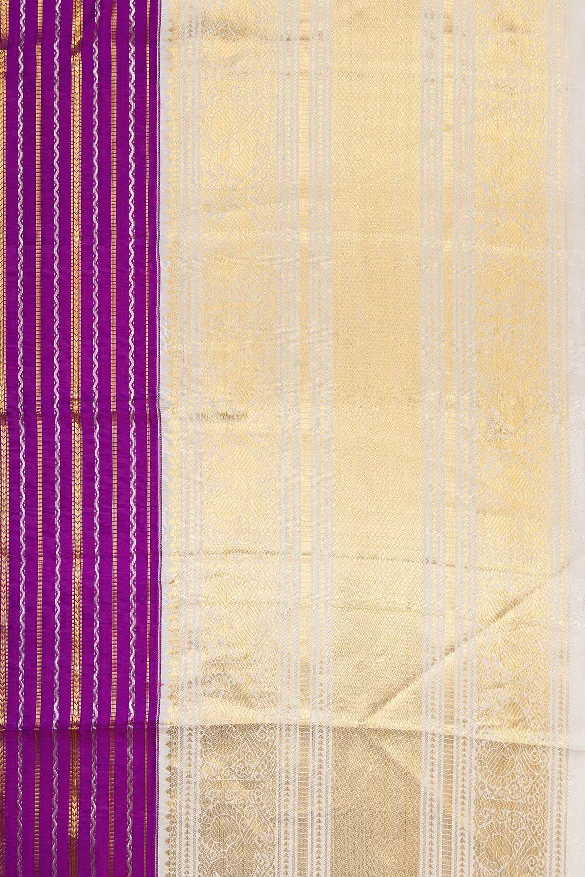 Border image of Magenta Dual Tone Kanchipuram Silk Saree with Stripes on the body and Zari Border. 