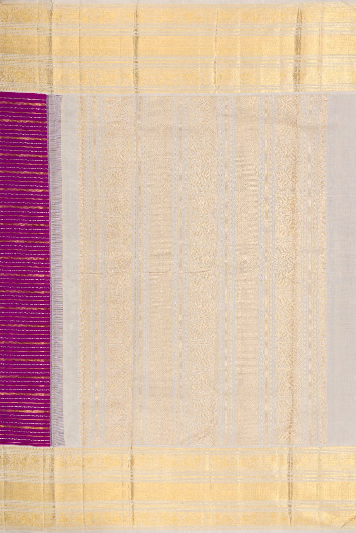 Close up image of the pallu of Magenta Dual Tone Kanchipuram Silk Saree with Stripes on the body and Zari Border. 