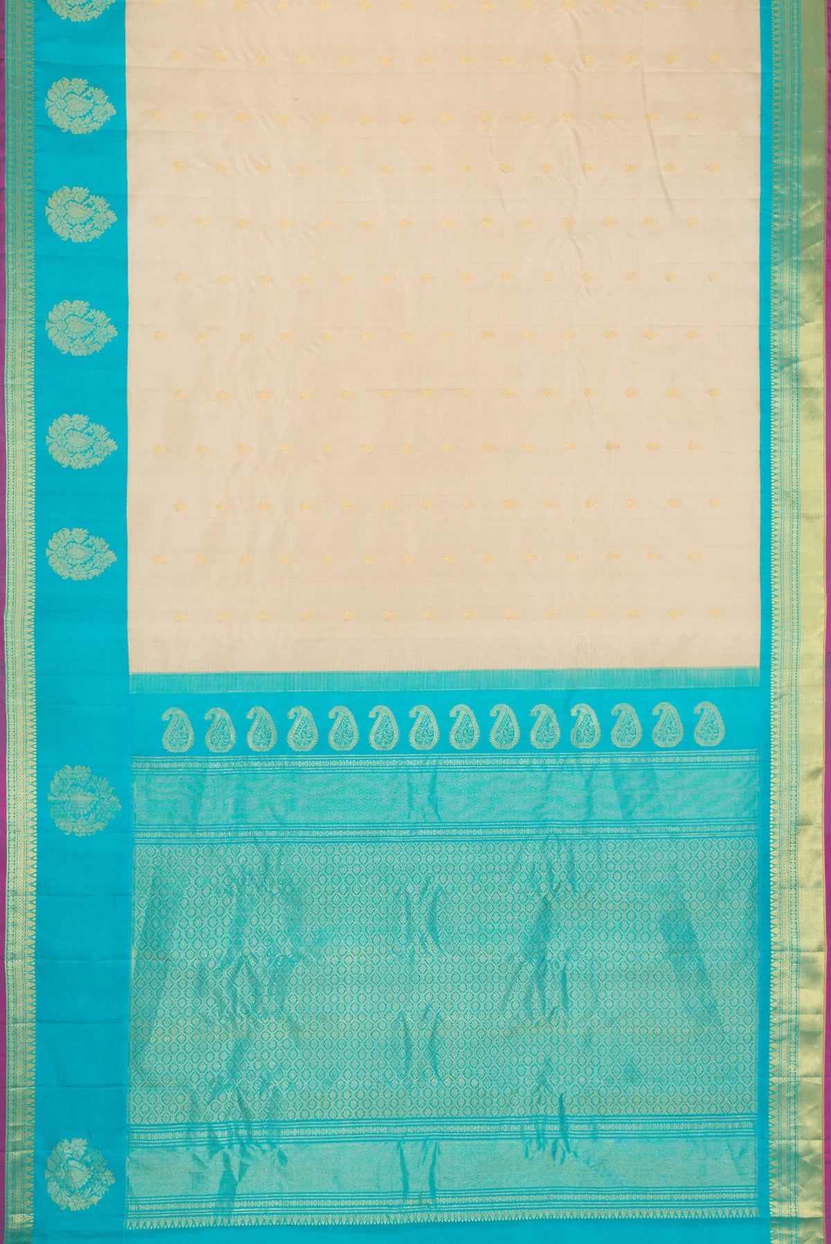Flat view of Beige Dual Tone Gadwal Silk Saree with Zari Butta on the body and Fancy Border. 