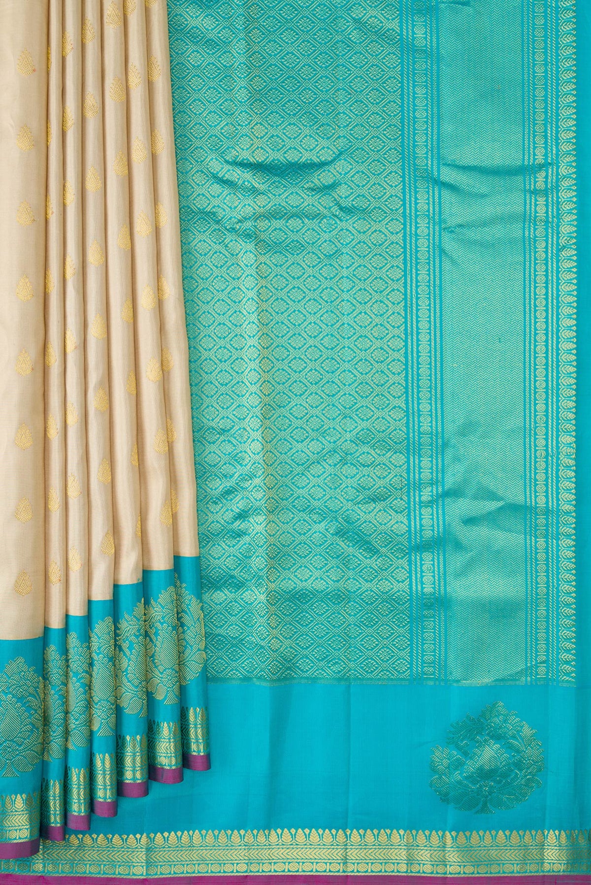 Pleats and pallu of Beige Dual Tone Gadwal Silk Saree with Zari Butta on the body and Fancy Border. 
