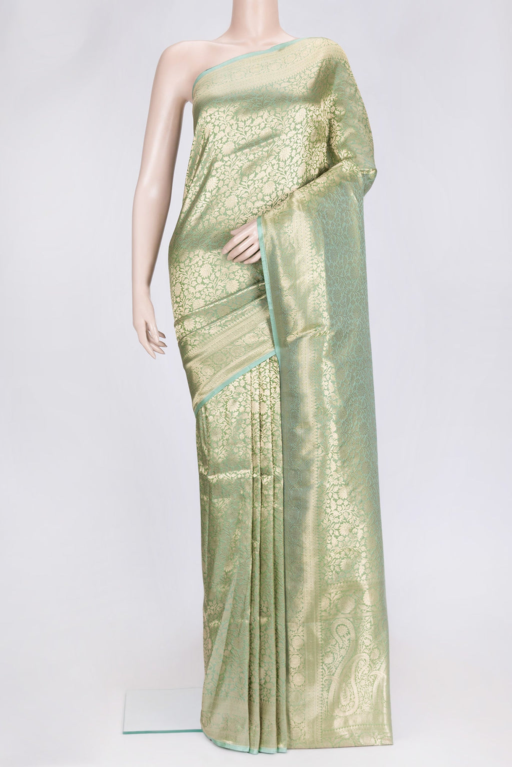 Sea Green Dual Tone Banarasi Silk Saree with Zari Brocade on the body and Zari Border.  displayed on a mannequin