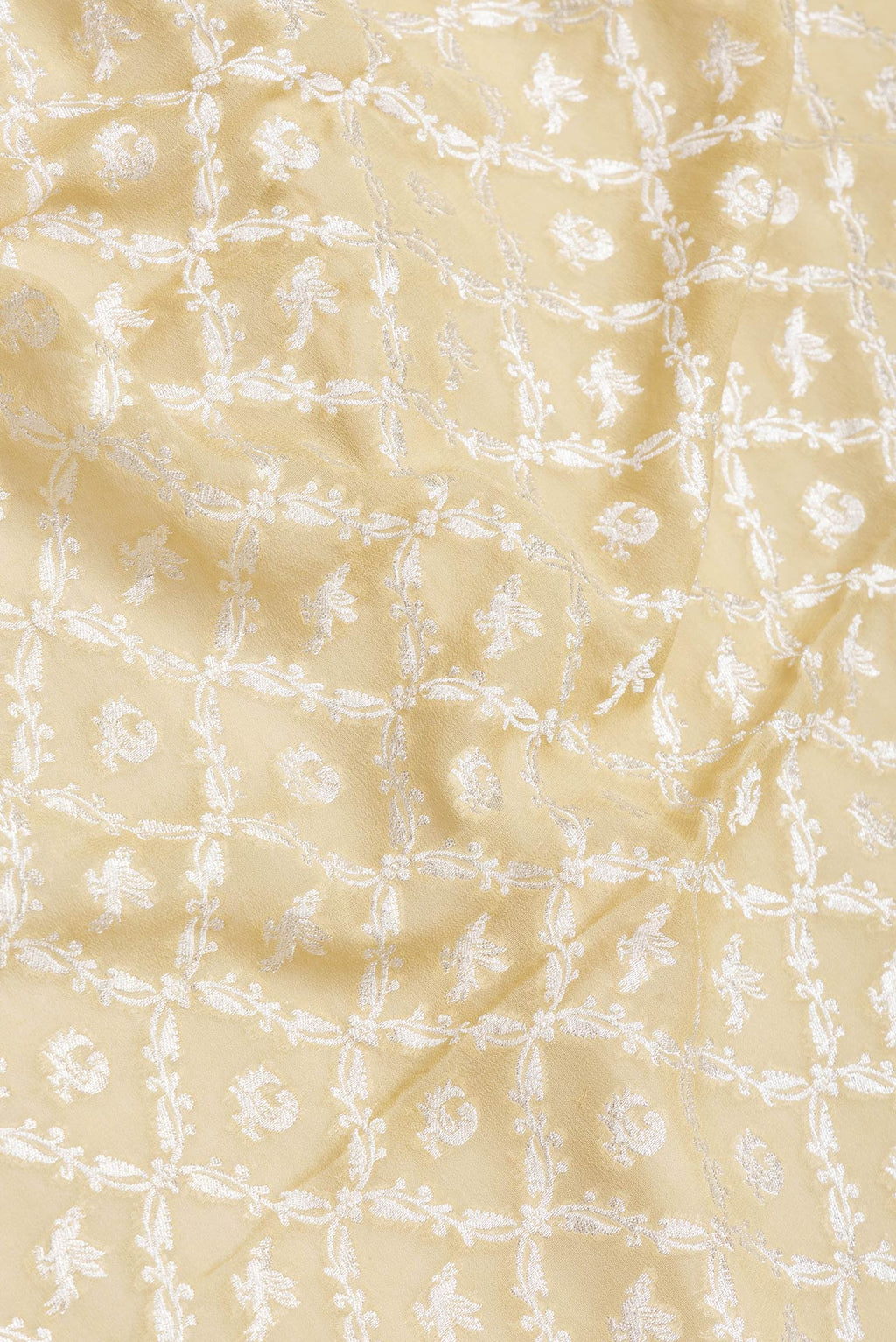 Close up of Sandal Dual Tone Banarasi Georgette Saree with Zari Brocade on the body and Zari Border.  displaying folds