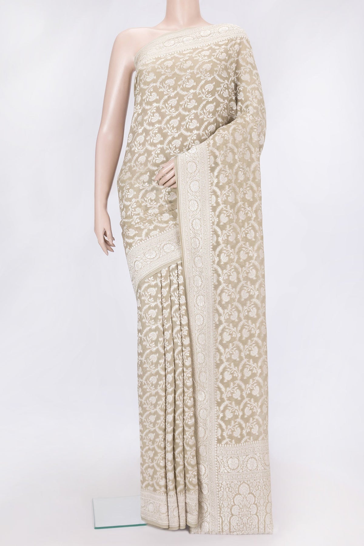 Mehandi Green Dual Tone Banarasi Georgette Saree with Zari Brocade on the body and Zari Border.  displayed on a mannequin