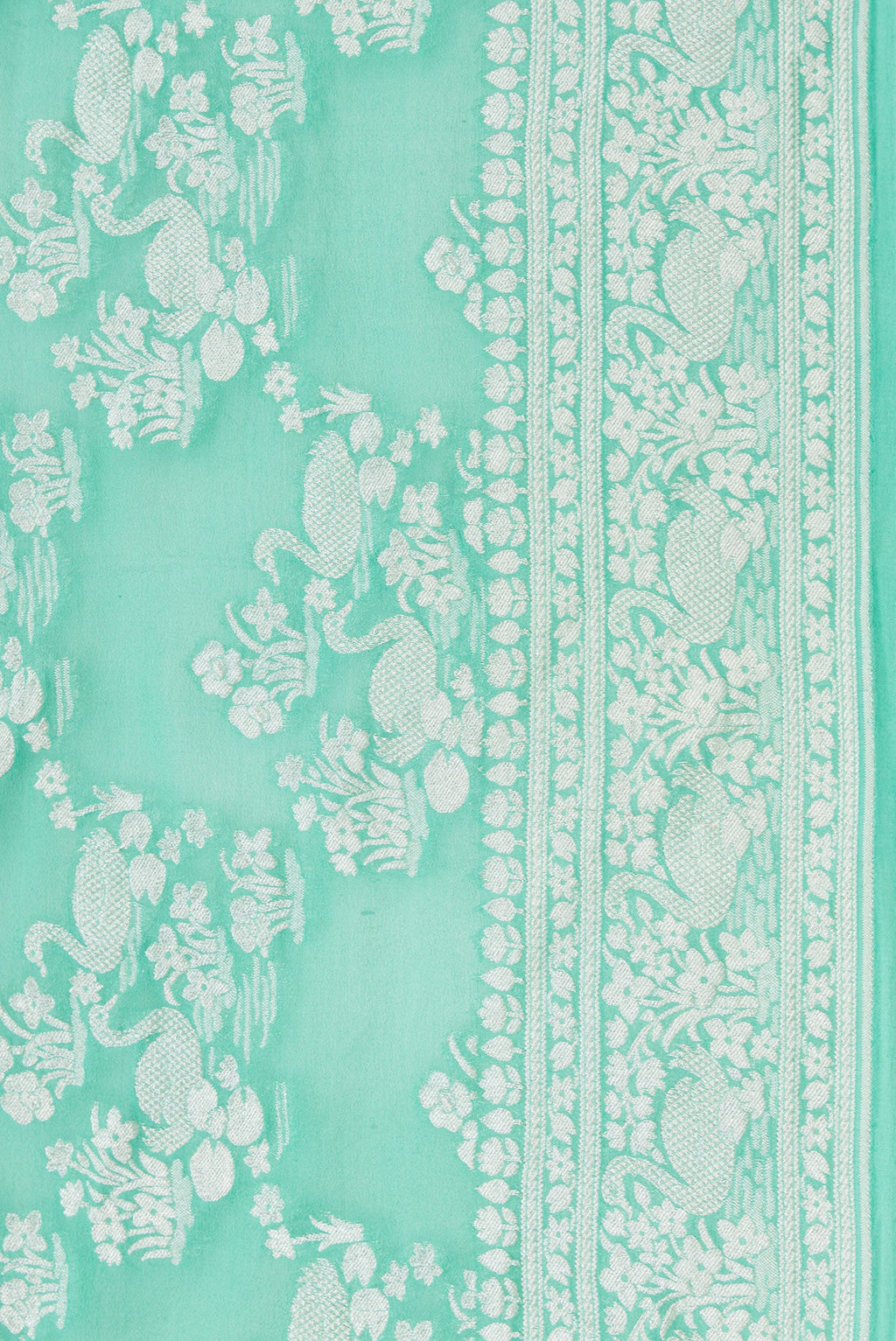 Border image of Sea Green Dual Tone Mysore Georgette Saree with Zari Brocade on the body and Zari Border. 