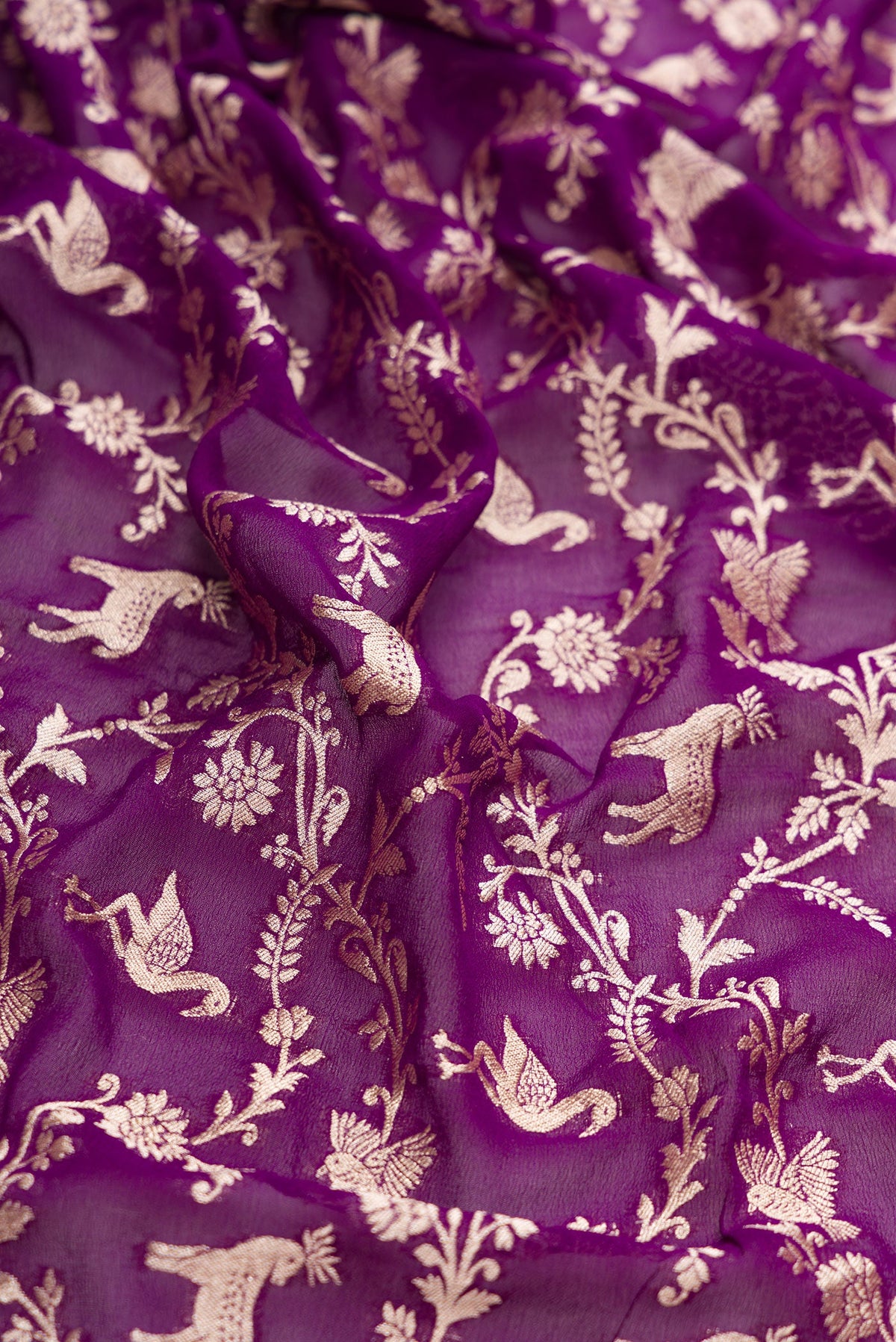 Close up of Royal Blue Dual Tone Mysore Georgette Saree with Zari Brocade on the body and Zari Border.  displaying folds
