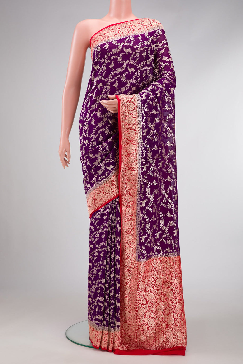 Royal Blue Dual Tone Mysore Georgette Saree with Zari Brocade on the body and Zari Border.  displayed on a mannequin