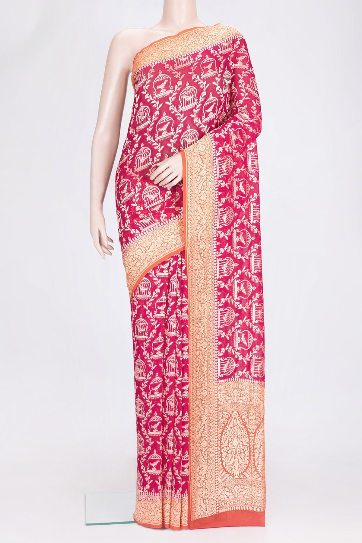 Pink Dual Tone Banarasi Georgette Saree with Zari Brocade on the body and Zari Border.  displayed on a mannequin