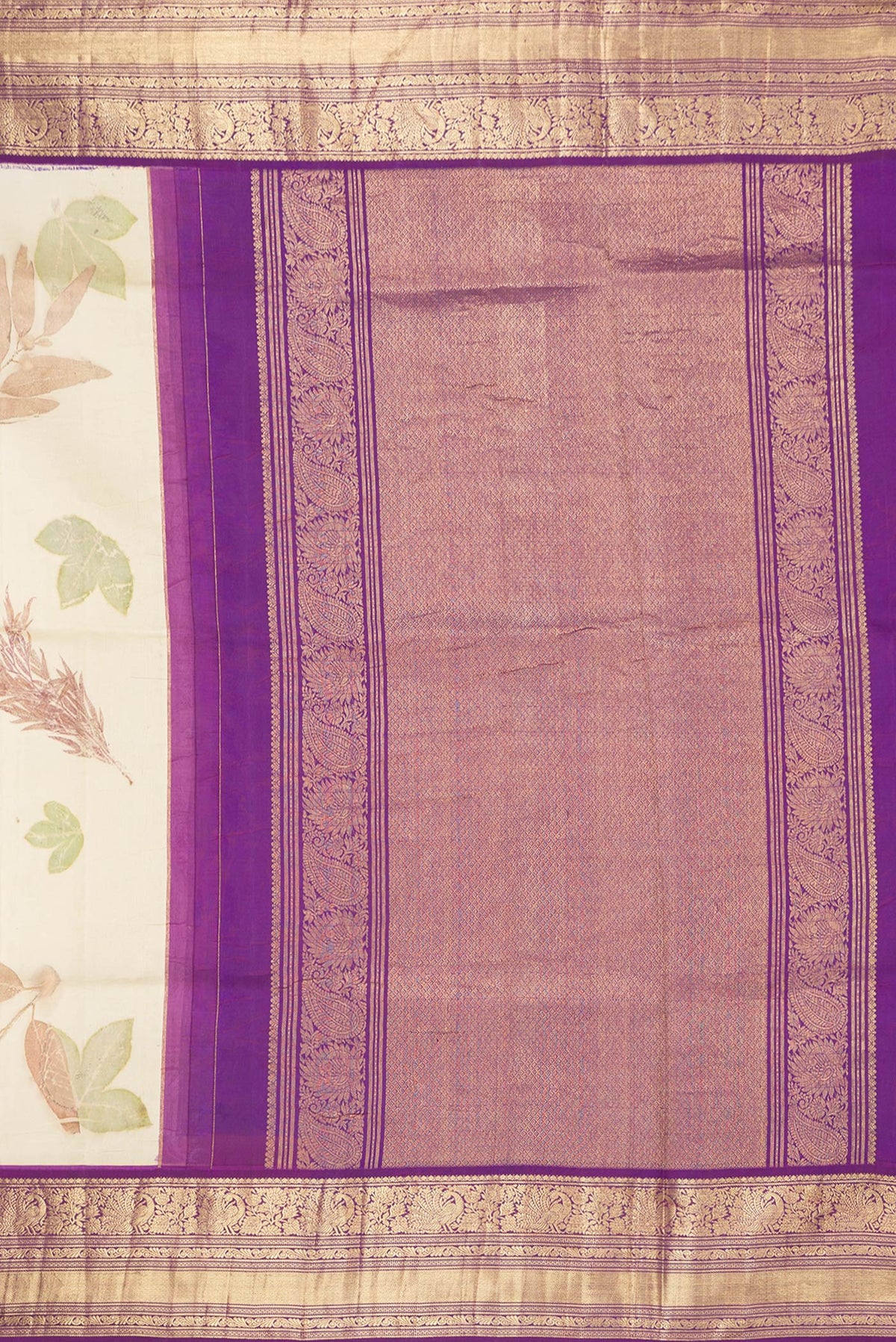 Close up image of the pallu of Beige Dual Tone Kanchipuram Silk Saree with Printed design on the body and Zari Border. 
