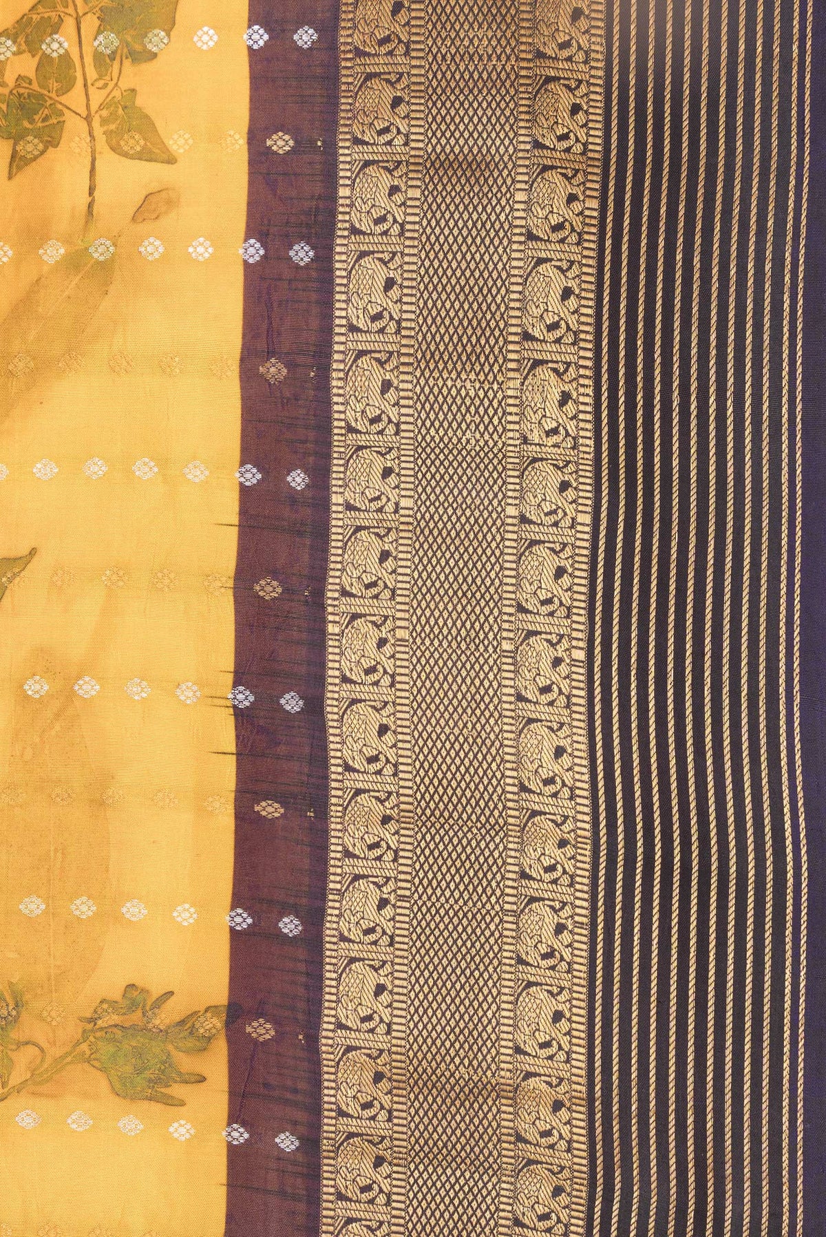 Border image of Mustard Dual Tone Kanchipuram Silk Saree with Printed design on the body and Zari Border. 