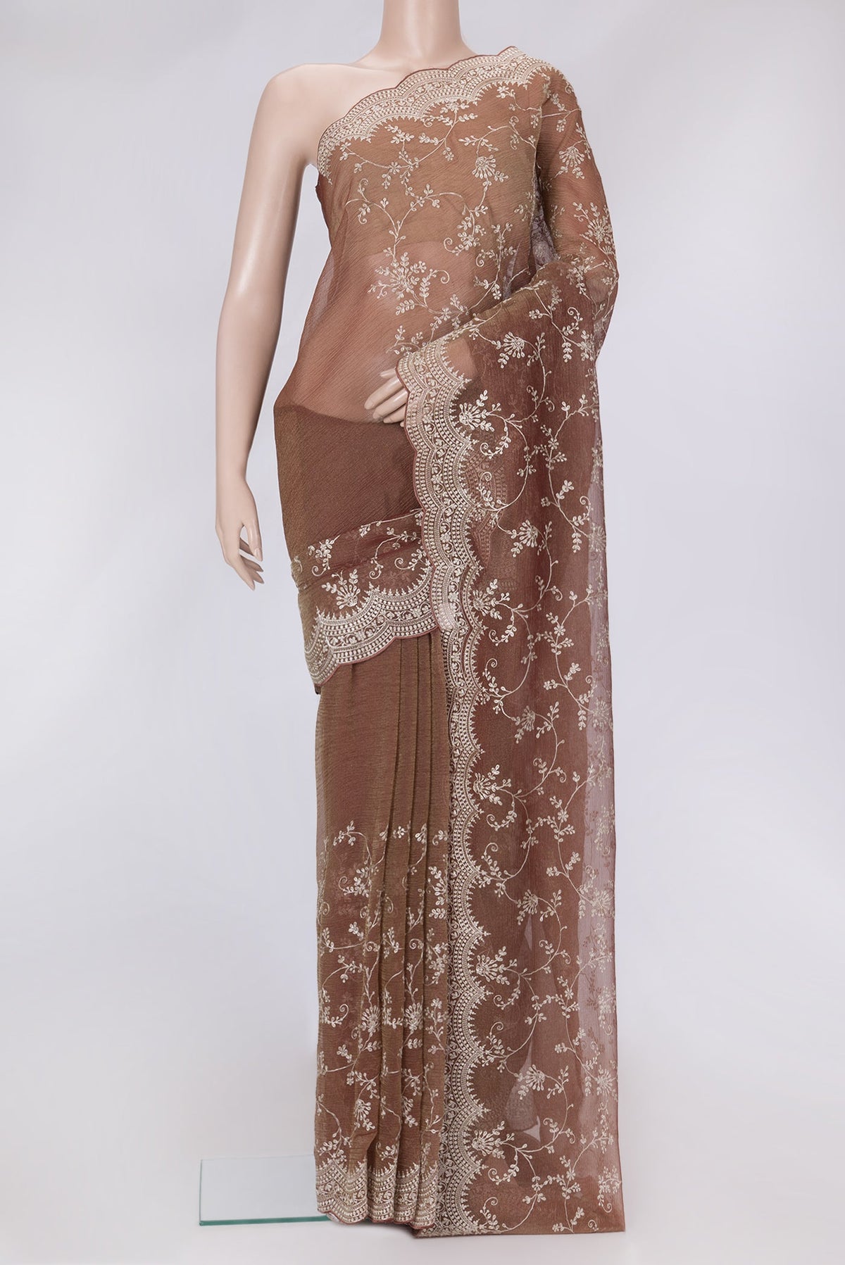 Brown Dual Tone Organza Silk Saree with Embroidery on the body and Embroidery Border.  displayed on a mannequin