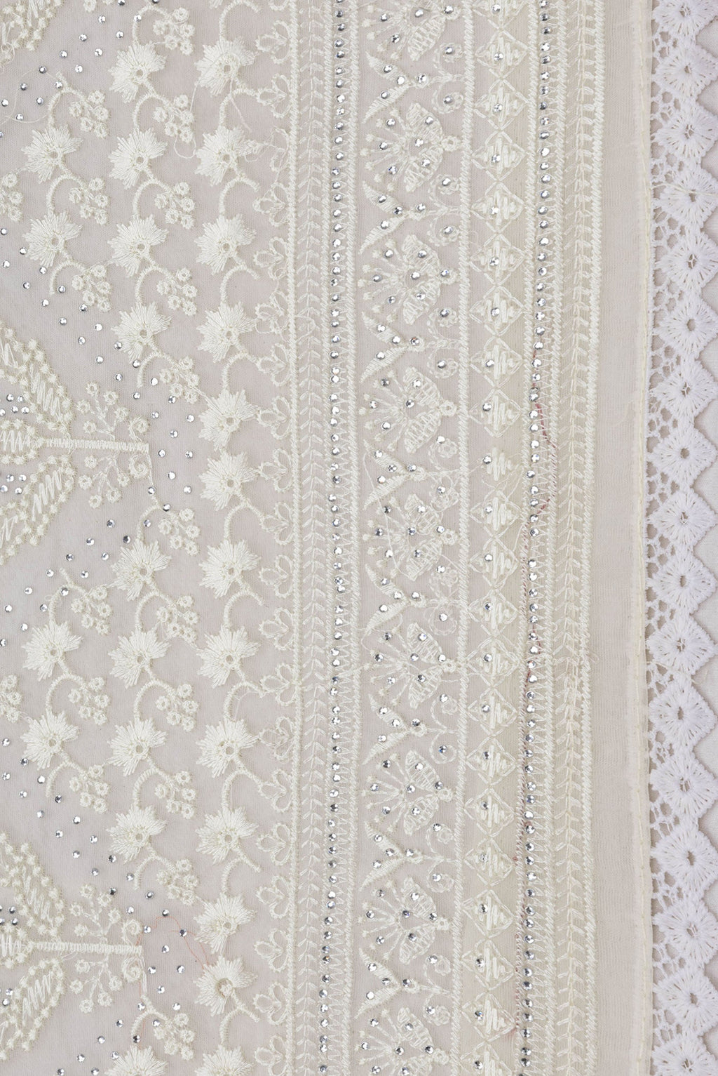 Border image of Sandal Dual Tone Organza Silk Saree with Embroidery on the body and Embroidery Border. 