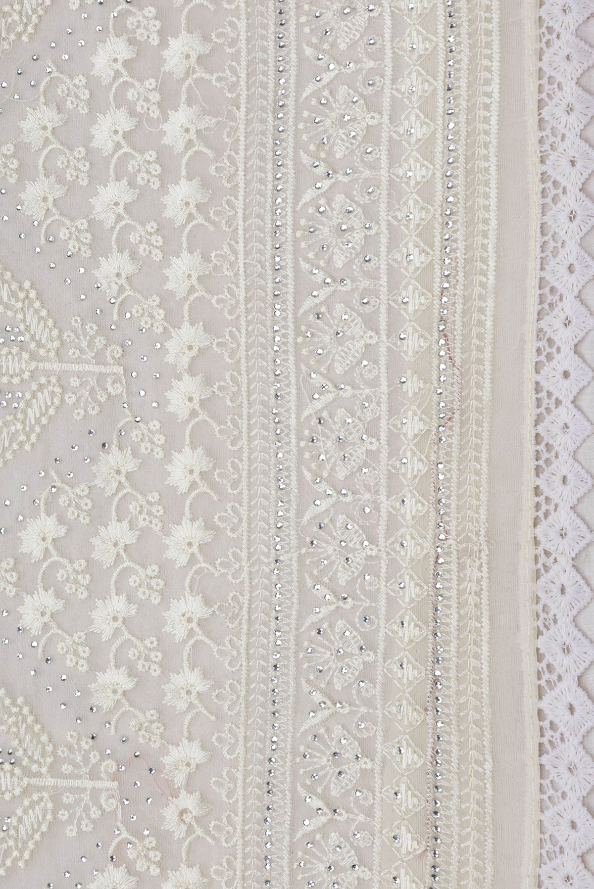 Border image of Sandal Dual Tone Organza Silk Saree with Embroidery on the body and Embroidery Border. 