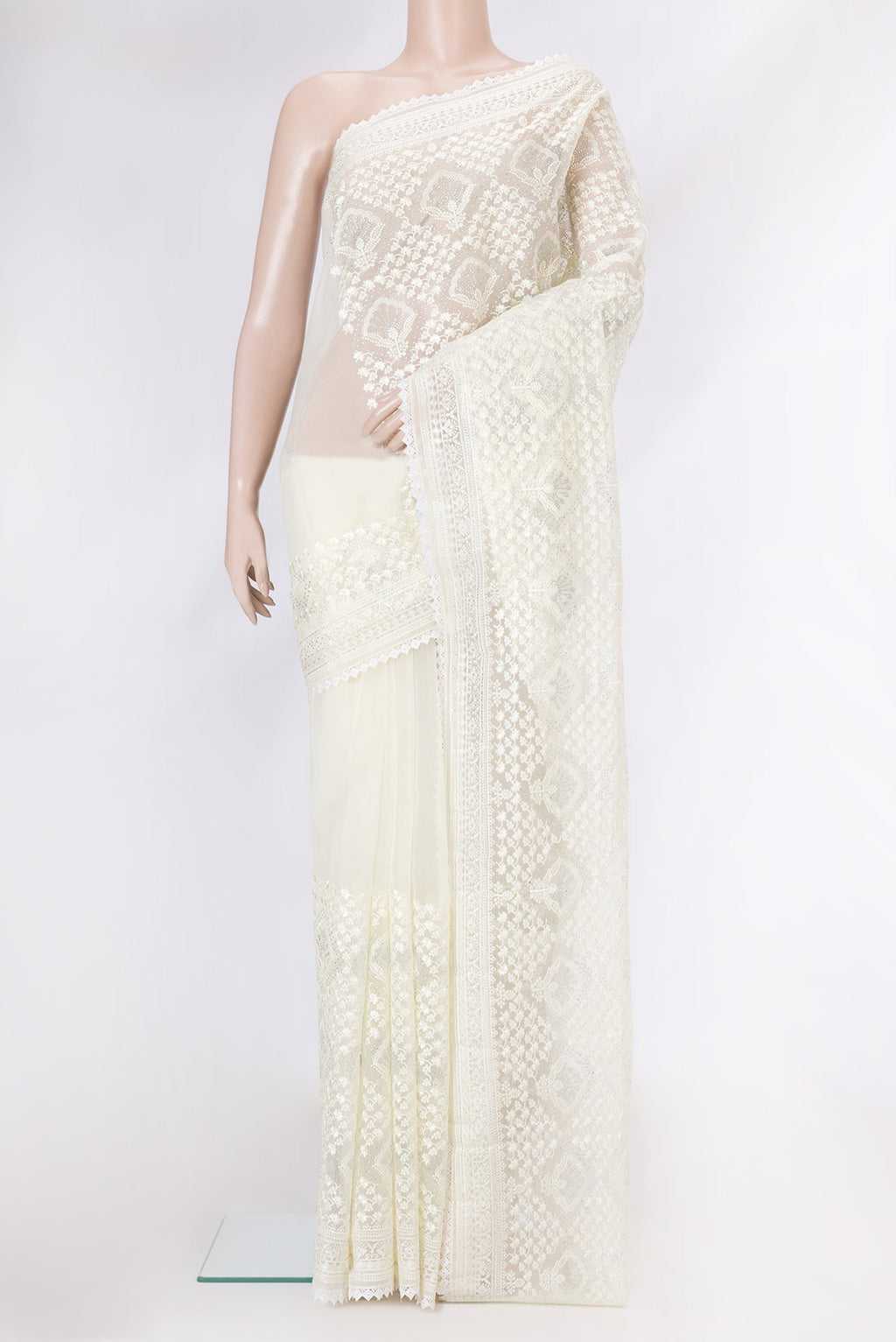 Sandal Dual Tone Organza Silk Saree with Embroidery on the body and Embroidery Border.  displayed on a mannequin