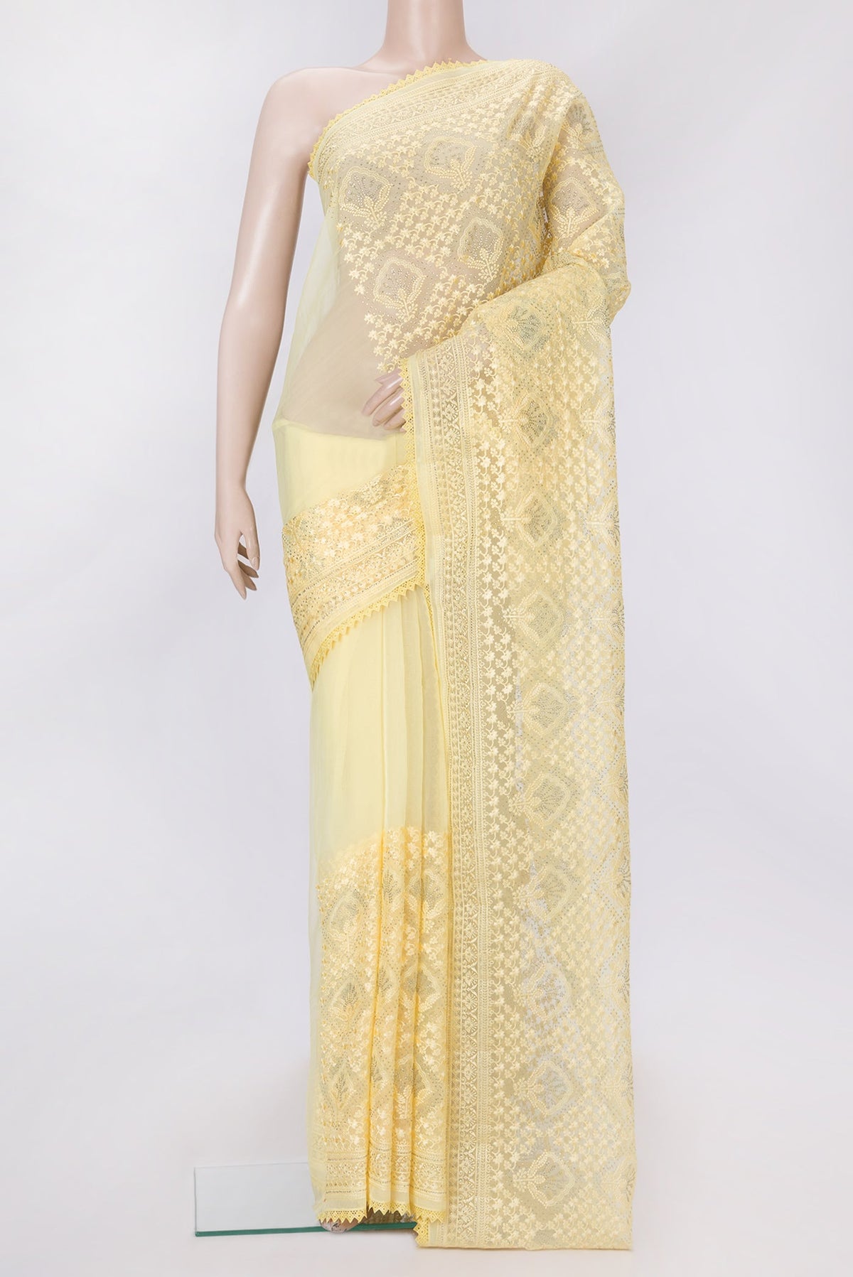 Yellow Dual Tone Organza Silk Saree with Embroidery on the body and Embroidery Border.  displayed on a mannequin