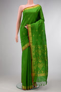 Green Dual Tone Soft Silk Saree with Zari Butta on the body and Zari Border.  displayed on a mannequin