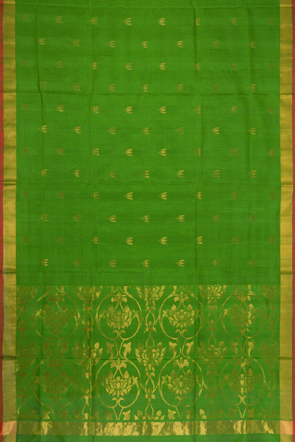 Flat view of Green Dual Tone Soft Silk Saree with Zari Butta on the body and Zari Border. 