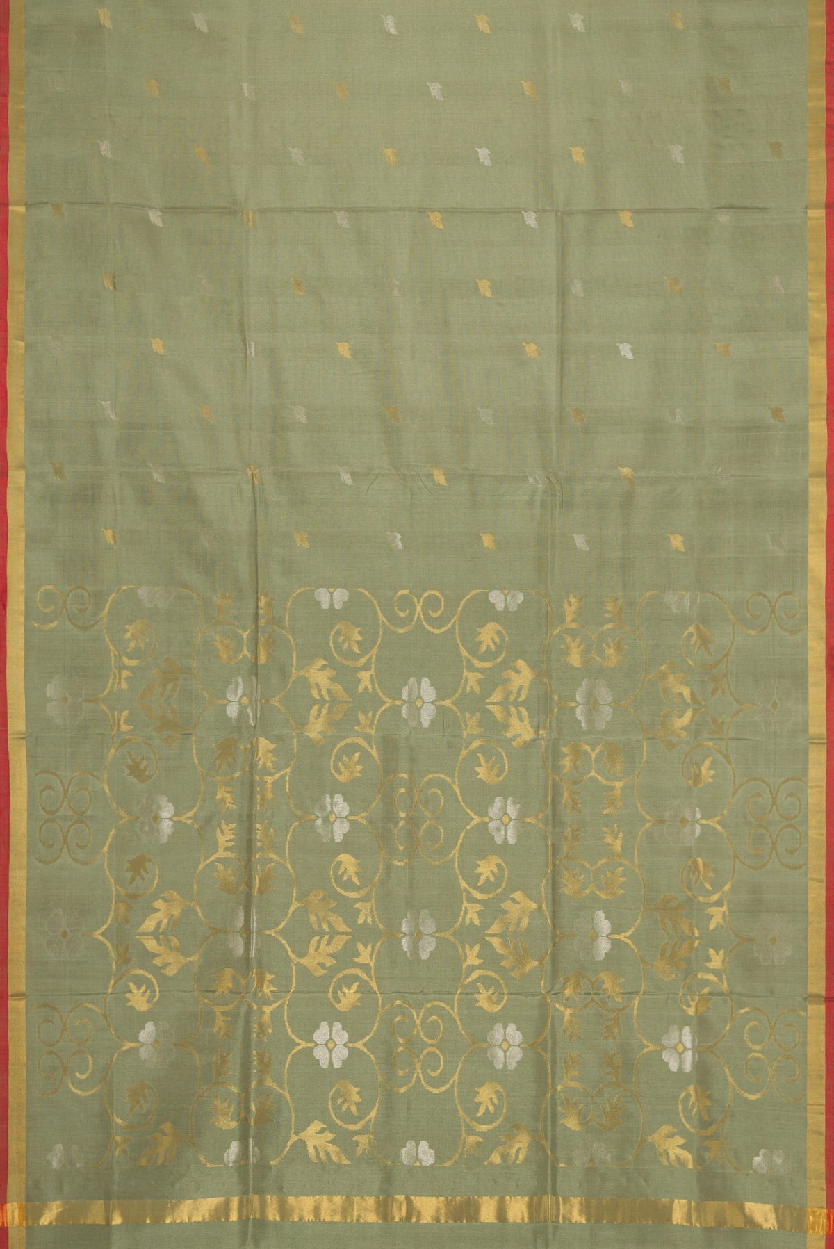 Flat view of Light Green Dual Tone Soft Silk Saree with Zari Butta on the body and Zari Border. 