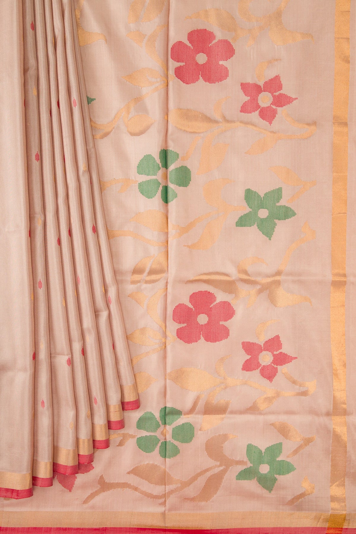 Pleats and pallu of Dark Beige Dual Tone Uppada Silk Saree with Zari And Thread Butta on the body and Zari Border. 