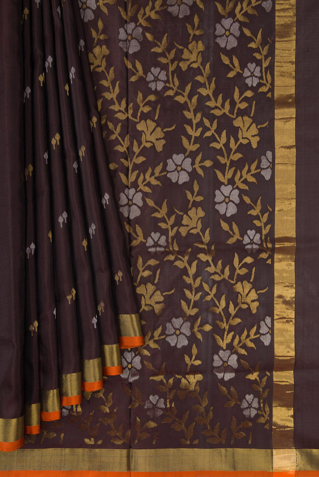 Pleats and pallu of Coffee Brown Dual Tone Uppada Silk Saree with Zari Butta on the body and Zari Border. 