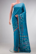 Sky Blue Dual Tone Uppada Silk Saree with Zari And Thread Butta on the body and Fancy Border.  displayed on a mannequin