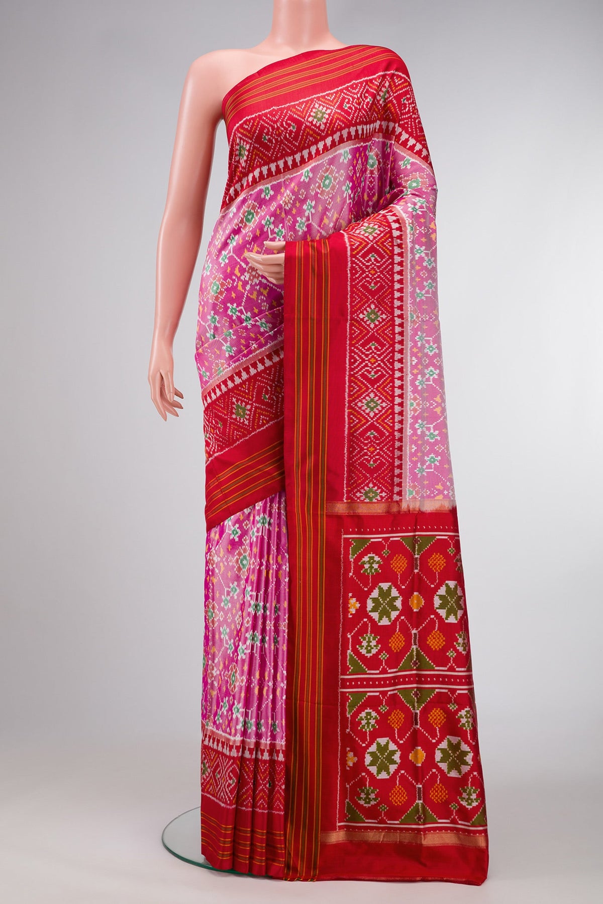 Pink Dual Tone Double Ikat Saree with Ikat Print on the body and Ikat Border.  displayed on a mannequin