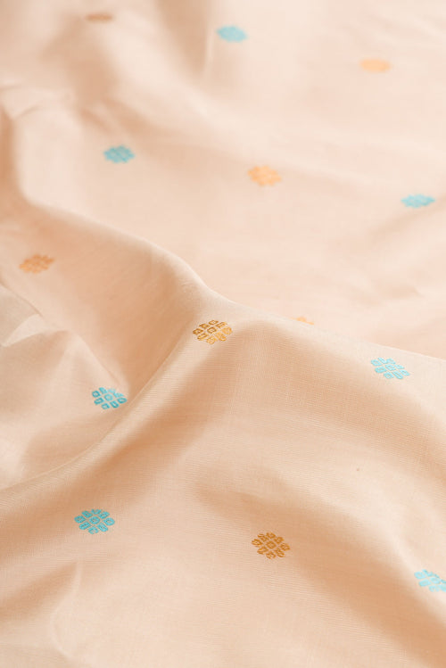 Close up of Dark Beige Dual Tone Gadwal Silk Saree with Zari And Thread Butta on the body and Zari Border.  displaying folds